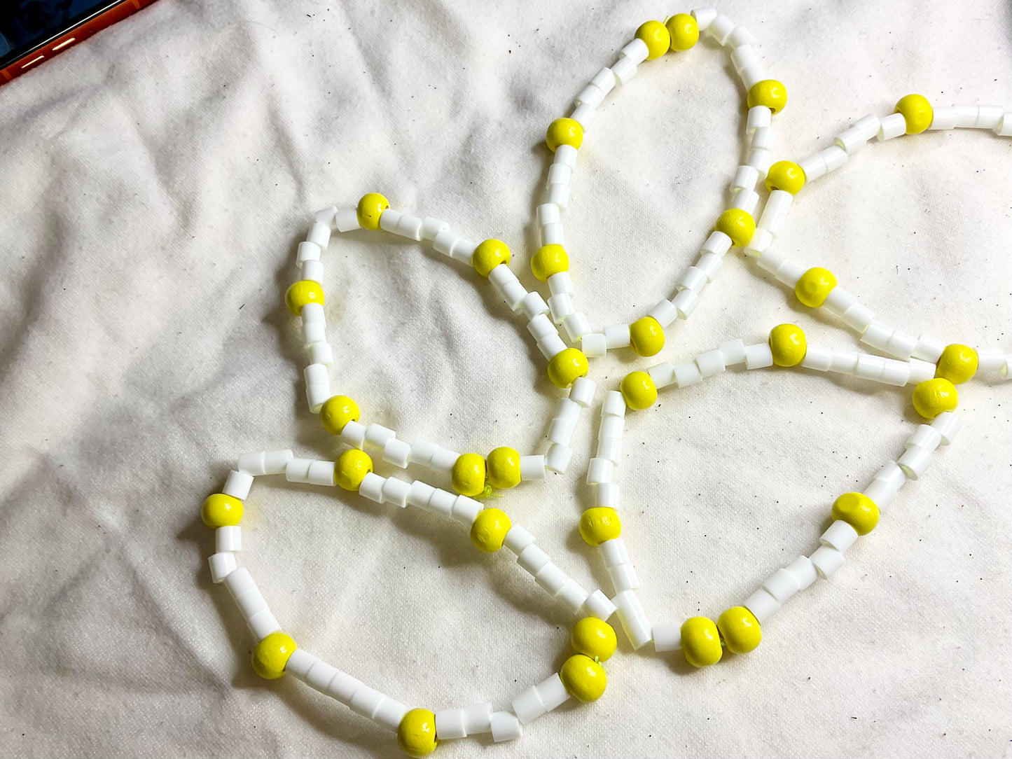 White Bead Bracelet with Yellow Pony Beads