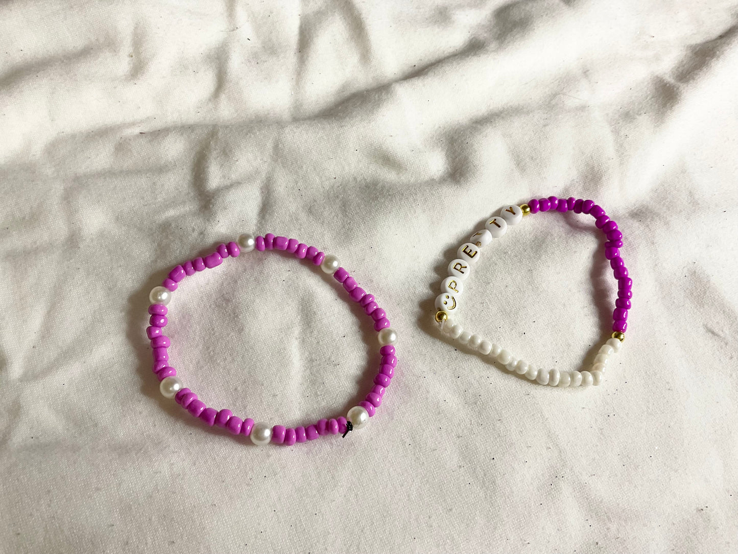 Pink and White Seed Bead Bracelet with Word PRETTY