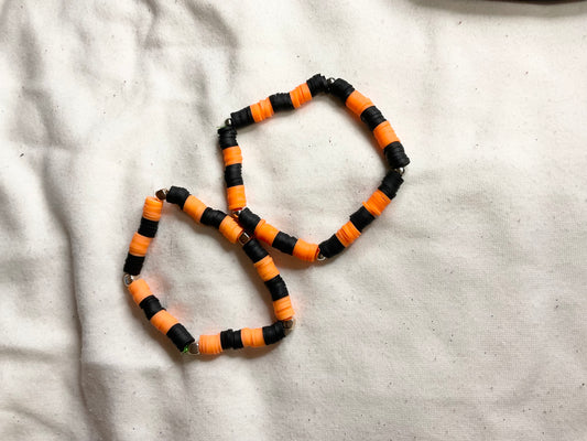 Orange and Black Clay Bead Bracelet with Spacer Beads